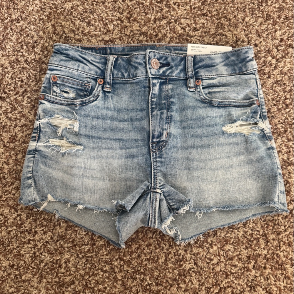 AE American Eagle Next Level High-Rise Shortie Shorts denim light wash